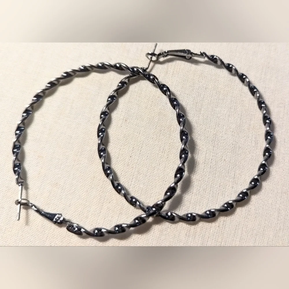 Big hoop earrings 2 inches, in dark metal. NWOT.